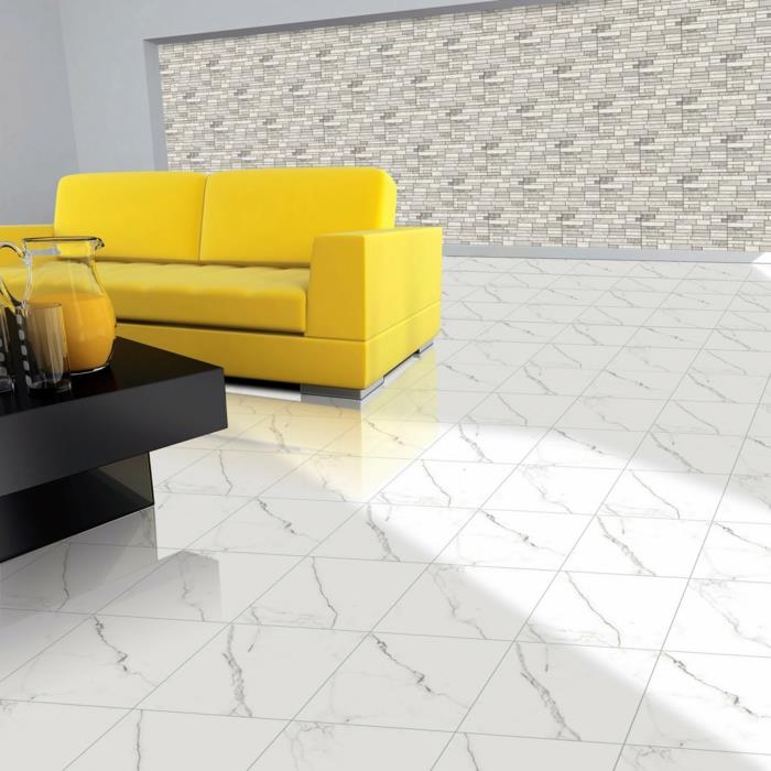 lattialaattojen suunnittelu olohuoneen sisustus keltainen sohva musta sohvapöytä