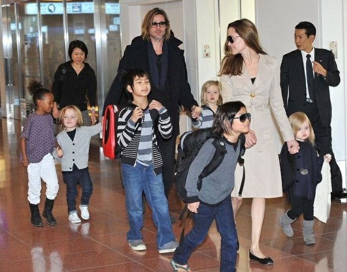brad pitt ja Angelina Jolie lapset lentokentällä