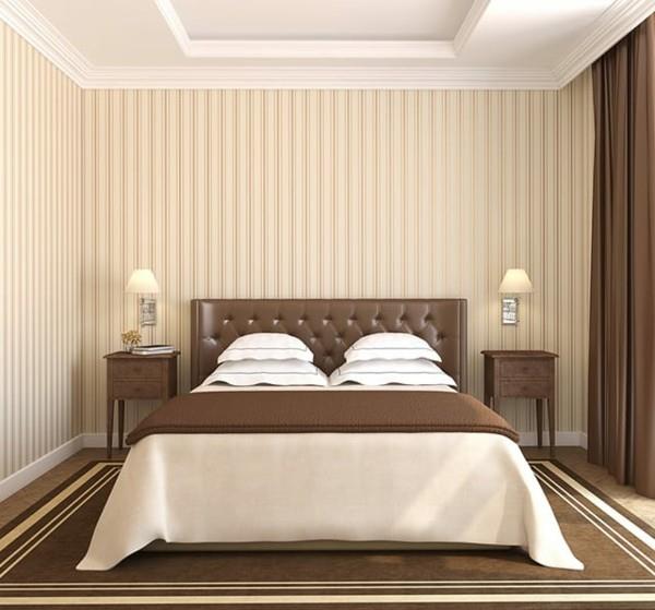 ruskeat sävyt tekevät makuuhuoneista symmetrisiä