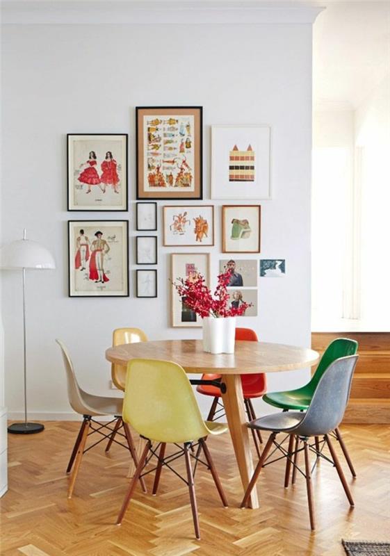 värikäs keittiö pystytetty värilliset tuolit pyöreä ruokapöytä
