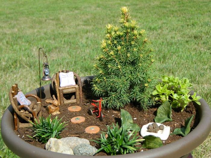 sisustus käsityöideoita mini puutarha nojatuoli lamppu kani pyörän kivet