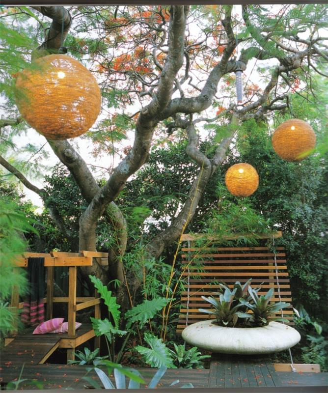 koriste puutarhajuhlat lyhdyt valaistus oranssi