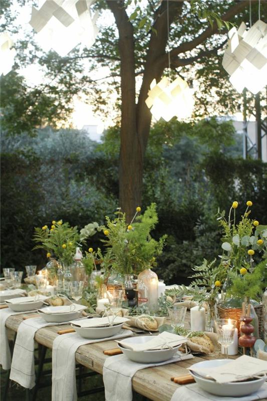 deco puutarhajuhlat kattokruunu pöytä koristavat kukkia