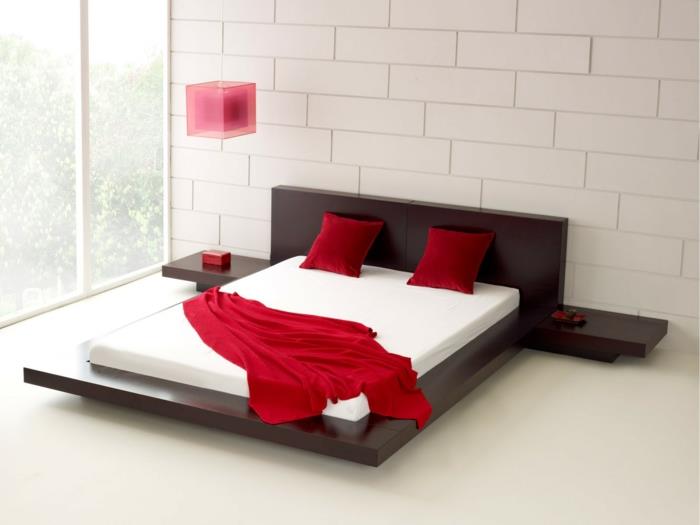 design -vuoteet parivuode minimalistiset punaiset tyynyt