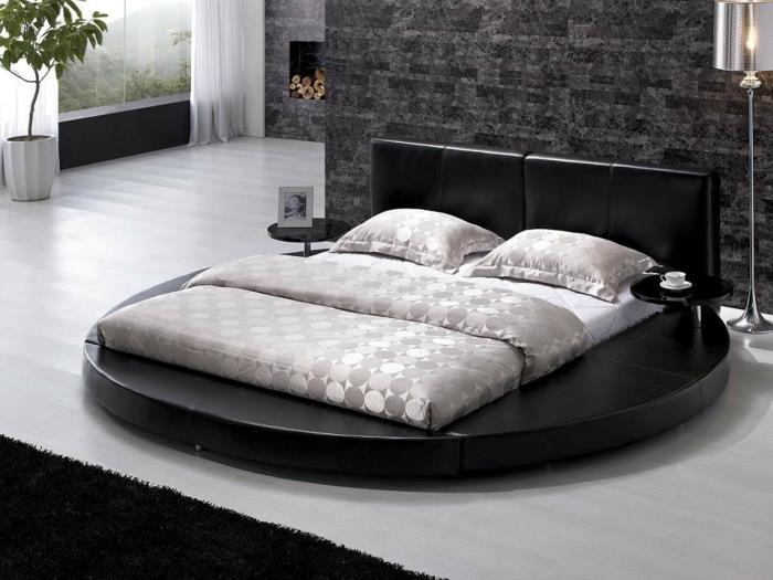 design sängyt musta pyöreä makuuhuone kasvit musta matto