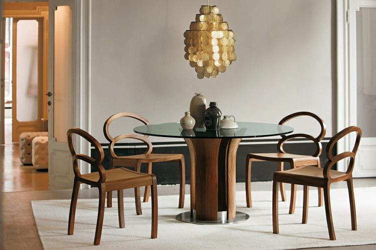 suunnittelija ruokapöydät puulasi puiset tuolit kattokruunut kultaiset aksentit koristavat tyylikkäästi ruokasalin