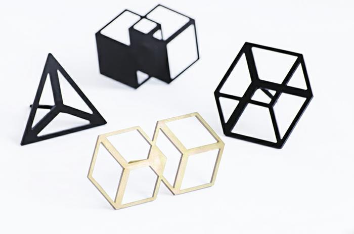 suunnittelija octavio asensio takki koukut suunnittelu geometrisia muotoja