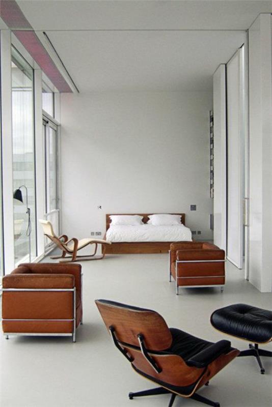 suunnittelija nojatuoli Charles Eames Lounge -tuoli, joka sisustaa makuuhuoneen