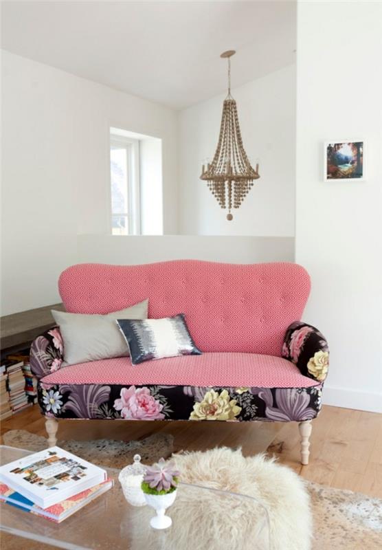 design -sohva vaaleanpunaisena aksenttina