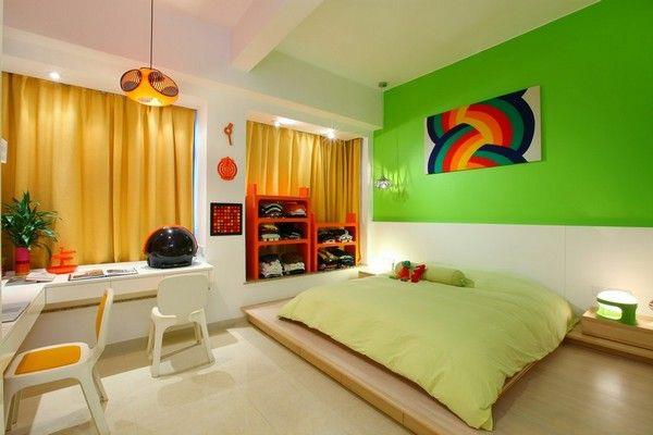 yhden huoneen huoneisto pystyttää sängyn vihreän seinän