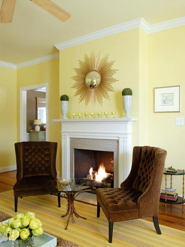 sisustus olohuone takka seinän värit paletti keltainen verhoiltu nojatuoli