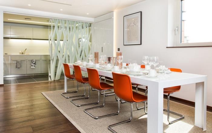 sisustusideoita keittiön sisustusvinkkejä modernit tuolit konsolituolit metalli oranssi muovinen ruokapöytä valkoinen