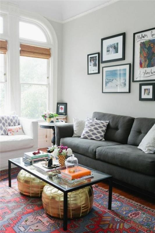 Eklektinen sisustus olohuone eklektinen tyyli jakkara harmaa sohva