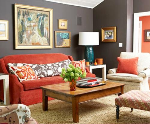 tyylikkäät olohuoneen kalusteet mustat seinät maalaukset punaiset sohvat