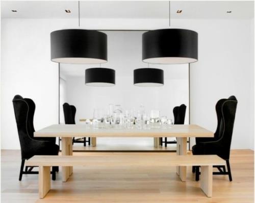 tyylikäs ruokasali suunnittelee idean mustasta minimalistisesta puusta