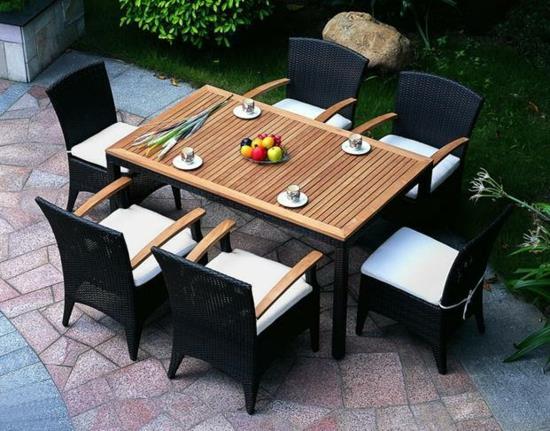 upea ruokasalin suunnittelu puutarhassa rottinkipuutarhan musta tuoli