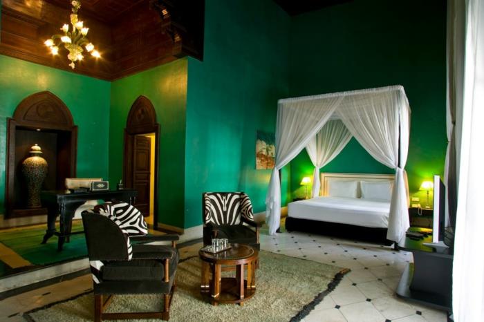 värit trendikkäitä sävyjä modernissa makuuhuoneessa metsästävät vihreitä seiniä