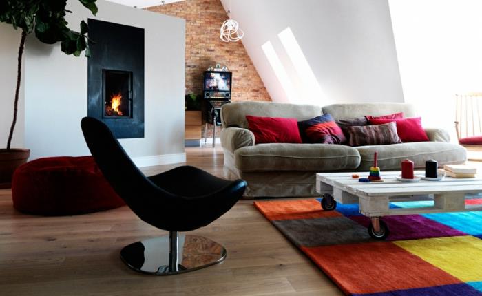 sisustus väri suunnittelu olohuone sohva takka tiiliseinä