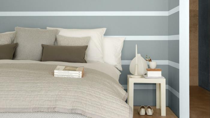 värisuunnittelu makuuhuoneen seinäväri harmaa valkoiset raidat seinäkoriste