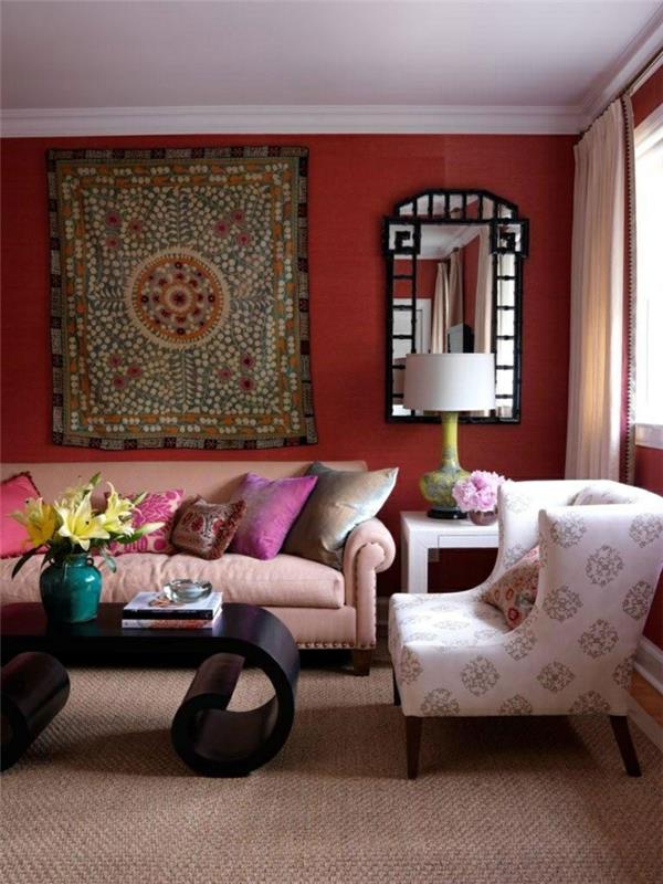 värimaailma olohuone punainen seinä väri sisalimatto epätavallinen sohvapöytä