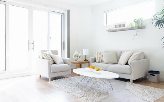 värisuunnittelu olohuone valkoinen olohuone soikea sohvapöytä valkoinen matto