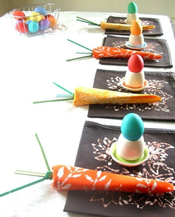 juhlapöydän koristeet pääsiäislautasille taita porkkanat pääsiäismunat