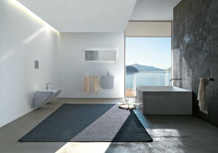 saumaton kylpyhuone viileä aksentti seinä harmaa matto valkoiset seinät