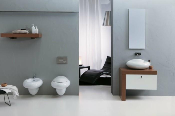 saumaton kylpyhuone vaaleanharmaat seinät valkoinen lattia