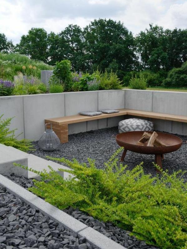 puutarhan istuinalue suunnittelu moderni oleskelualue paljon vihreää betonioptiikkaa