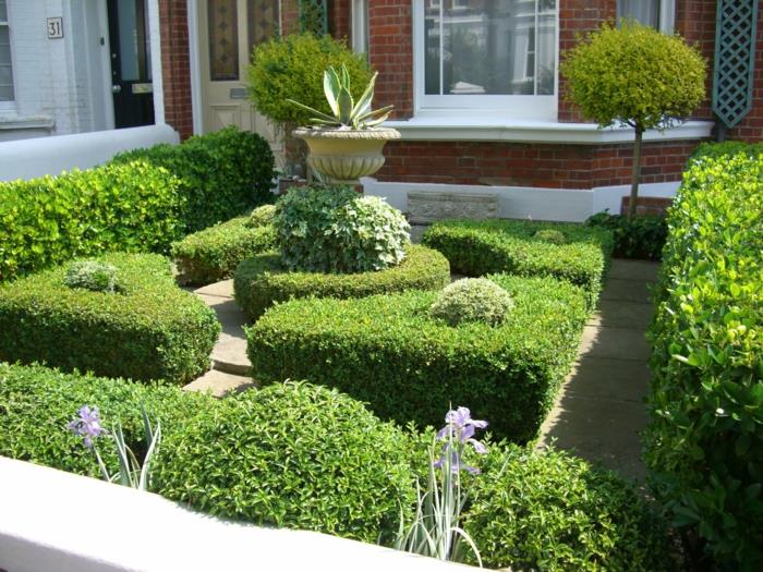 kaunistaa puutarha puutarhapolkuja kasvit talon julkisivutiilet