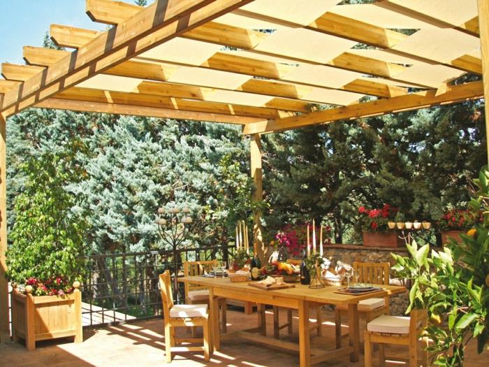 puutarhaideoita pergola puutarha puutarhakalusteet ruokailutila design kukat kynttilät