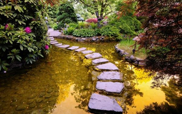 luo puutarhalampi vesi puutarha suunnittelu steinplatte