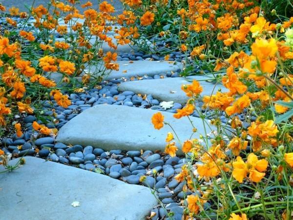 puutarhapolku ideoita kivi kivi polku keltaisia ​​kukkia
