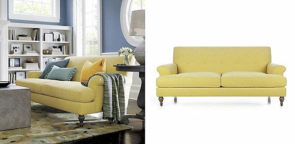 keltainen sohva verhoiltu kahteen paikkaan mukavasti