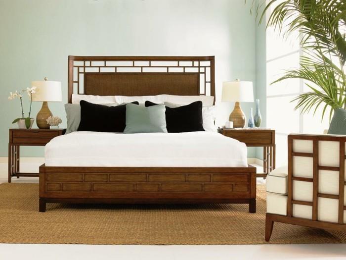 design -makuuhuone trooppinen puukalusteet vaaleanvihreä seinäväri