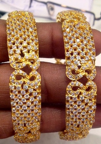 Diamond Studded Twenty Gram Gold Bangles Designs