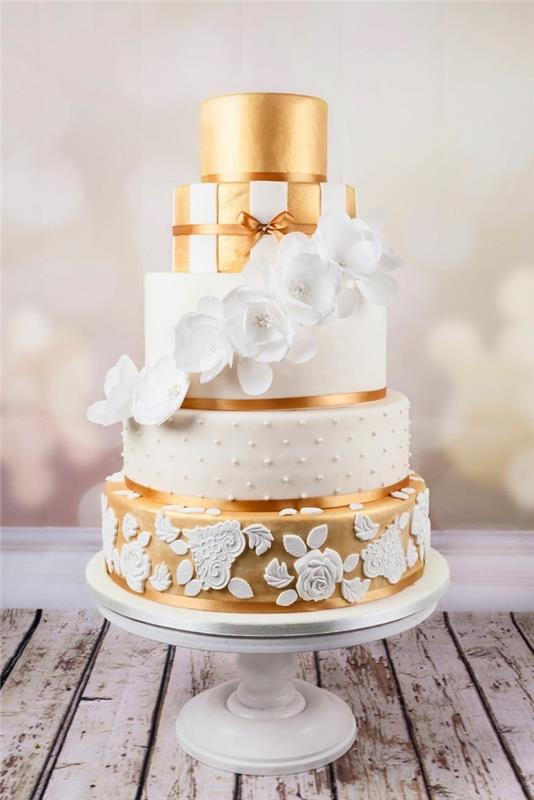 kultainen hääkakku 2017 lattiakakku valkoiset fondanttikukat