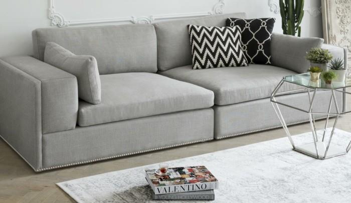 harmaa suunnittelija -sohva olohuoneen sisustusideoita heittää tyynyjä
