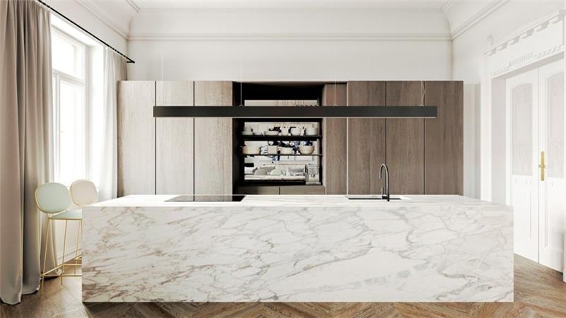 suuri keittiösaari marmorista modernissa keittiössä