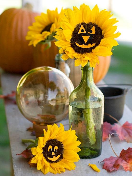 halloween -käsityöideoita auringonkukkia pelottavilla kasvoilla