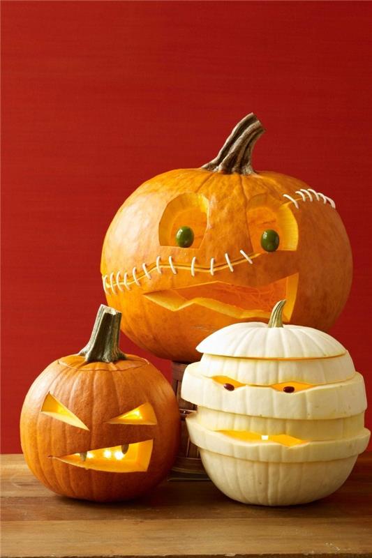 halloween -koristelu kolme erilaista kurpitsaa