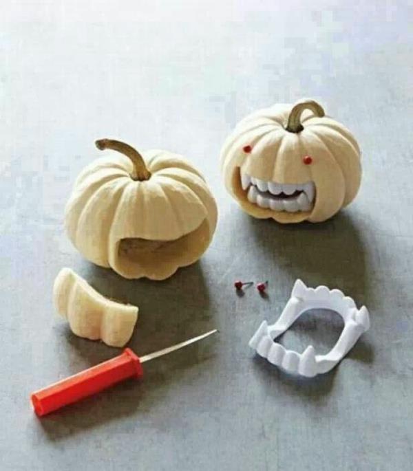 halloween -sisustusideoita kurpitsa koristele keinotekoisia hampaita punaiset silmät