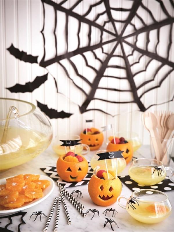 halloween -ideoita juhlapöytä kurpitsa pyörii