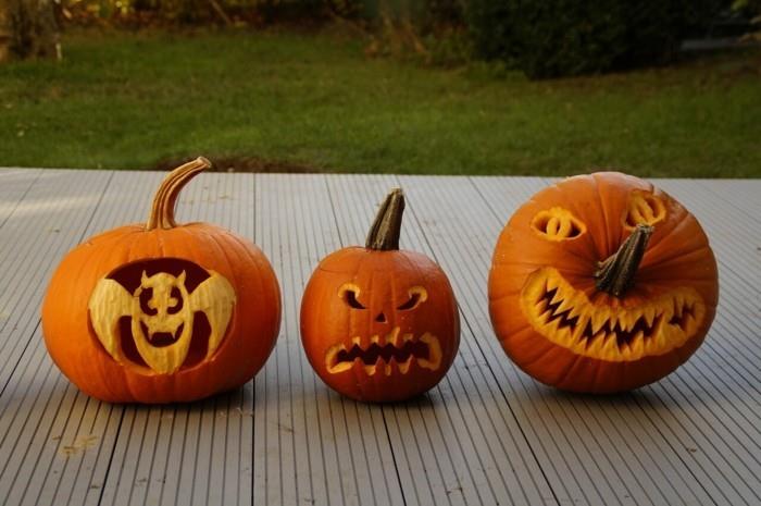 halloween -kurpitsa veistää erilaisia ​​kurpitsan kasvoja