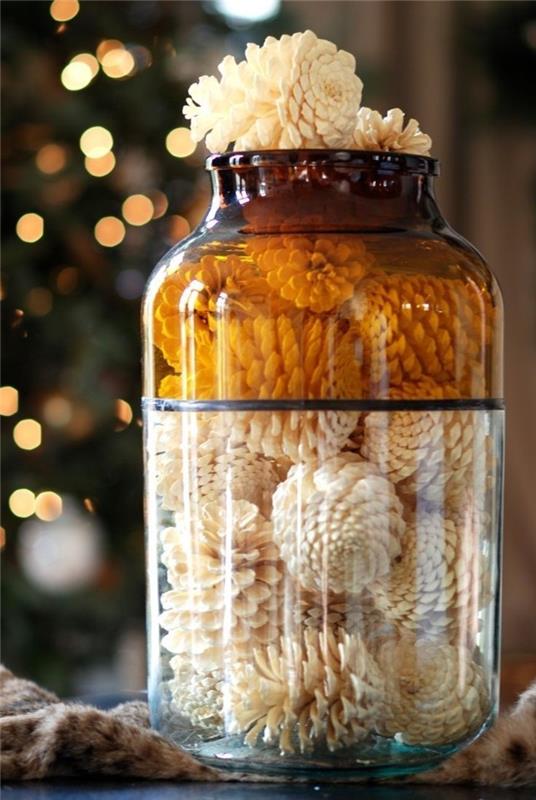 syksyn koristelu talvikoristelu näpertely männynkäpyillä takka joulukoriste lasi