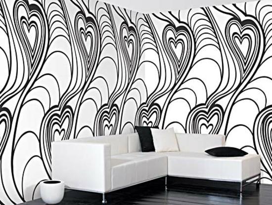 sydänkuvio musta valkoinen olohuoneen sohva valkoinen moderni seinämaalaus