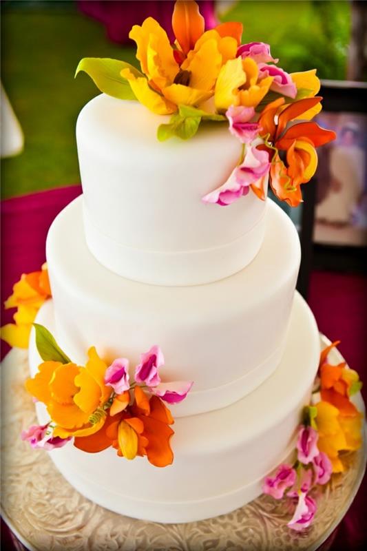 hääkakut valkoinen kakku värikkäällä koristeella Havaijin tyyliin