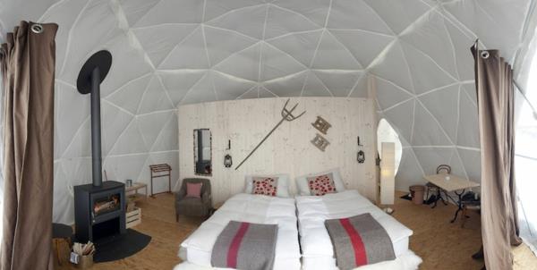 eco hotel iglu alpit parivuode takka