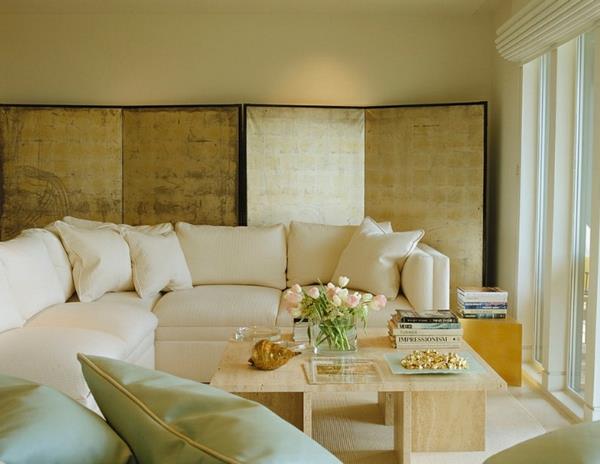 sisustusideoita egyptiläistyylinen väri aksentti kultainen huonejakaja näytön olohuoneen sohva