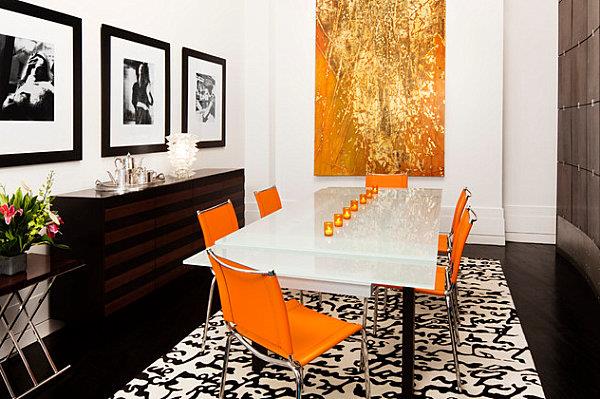 sisustusideoita oranssi sohva ruokailutila tuolit seinäkoriste